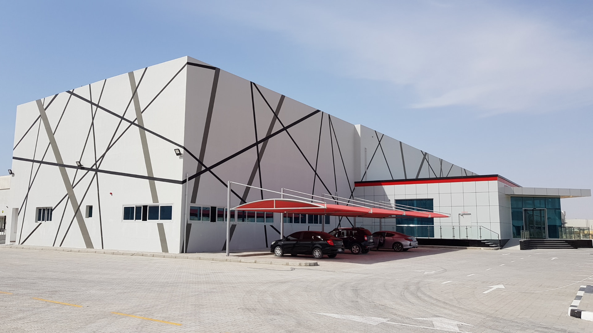 Completed industrial facility with feature facade