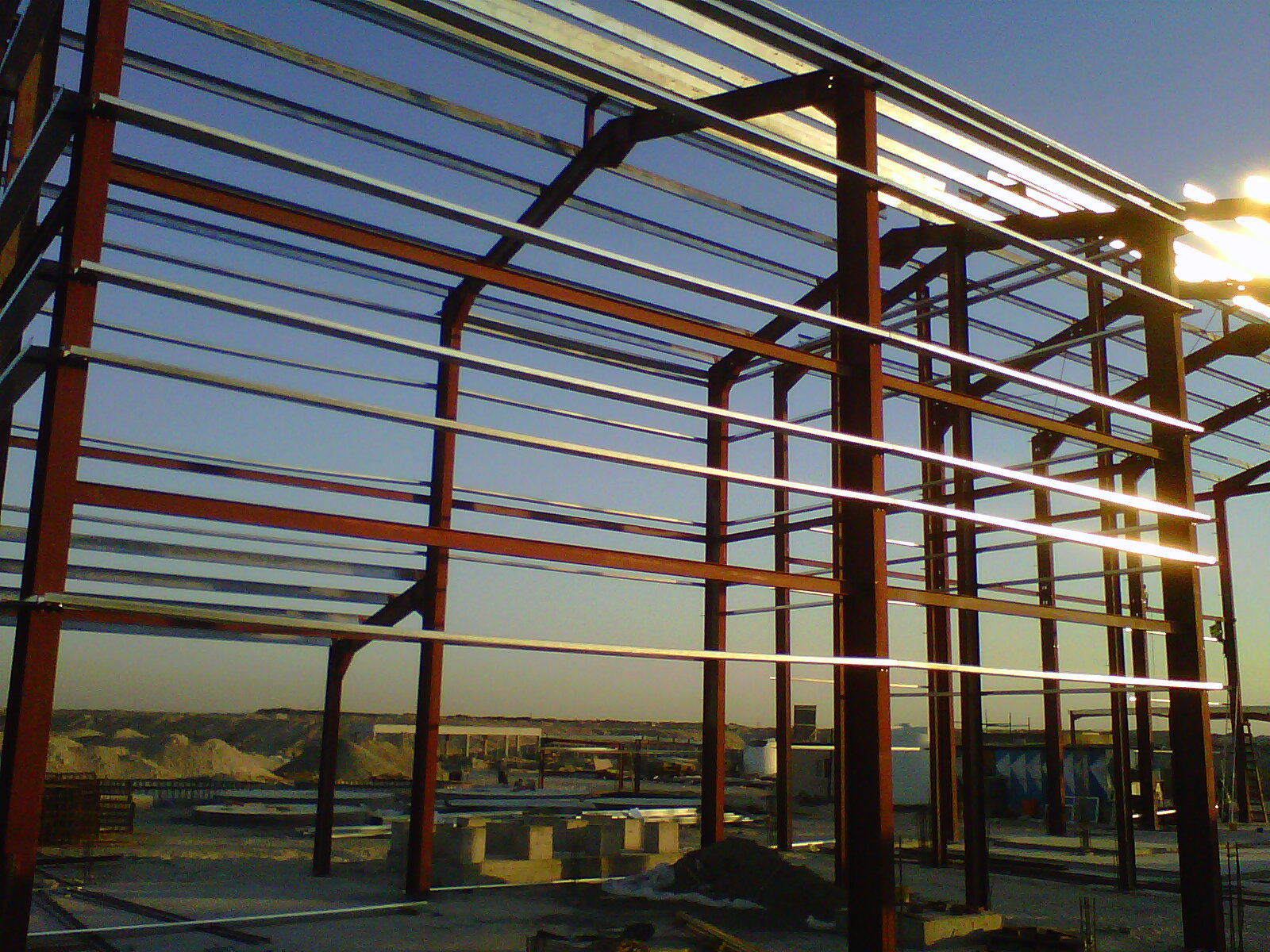 Steel frame structure at sunset